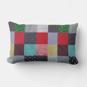 patterened squares of colourful patchwork lumbar cushion