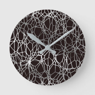 pattern and light black silver round clock
