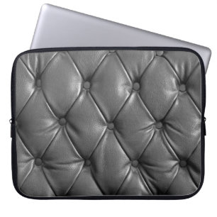 pattern of black genuine leather texture using as laptop sleeve