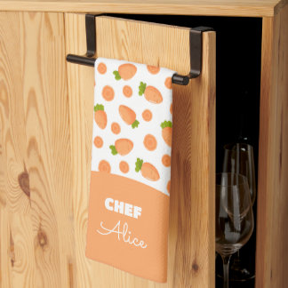 Pattern of small carrots and slices tea towel