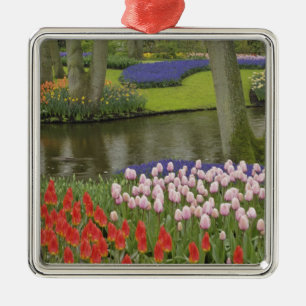 Pattern of tulips and grape hyacinth flowers, metal tree decoration