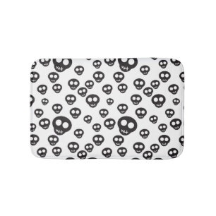 Pattern with black skulls on white bath mat