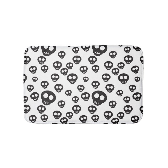 Pattern with black skulls on white bath mat (Front)