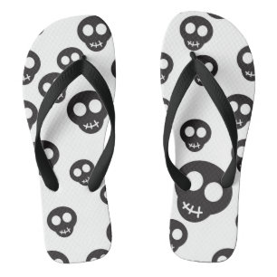 Pattern with black skulls on white jandals