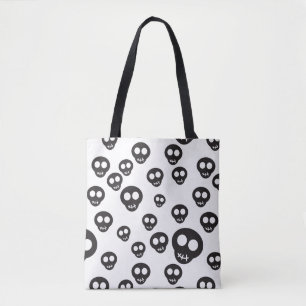 Pattern with black skulls on white tote bag