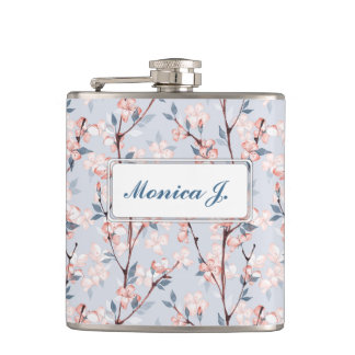 Pattern with delicate spring sakura flowers hip flask
