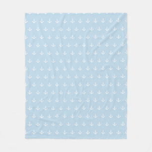 Pattern with white anchors on blue fleece blanket