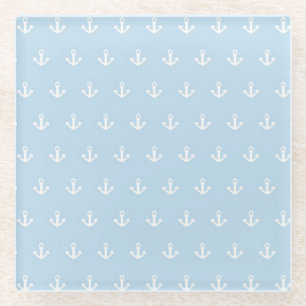 Pattern with white anchors on blue glass coaster
