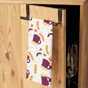 Patterned design with purple cats, yellow fish  tea towel