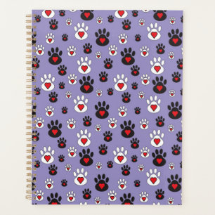 Pawprints with red hearts on blue planner
