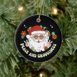 Peace and Grooviness Hippie Santa Christmas Ceramic Tree Decoration<br><div class="desc">Add a touch of fun and whimsy to your Christmas tree with this hippie Santa Claus "PEACE AND GROOVINESS" Christmas ornament.</div>