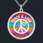 Peace and Love Tie Dye Stripes Silver Plated Necklace<br><div class="desc">Show some peace and love with this white peace sign and heart shape with the text "Peace & Love".  Background is colourful tie dye style stripes in a rainbow of colours including red,  pink,  green,  blue,  purple,  orange and yellow.</div>