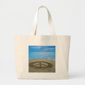 peace at the ocean large tote bag