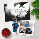 Peace Dove Photo Merry Christmas Black White Holiday Card<br><div class="desc">These 7" x 5" flat Christmas greeting cards feature an abstract dove in shades of black,  white and red. "Merry Christmas" in black and red along with a green olive branch. Customise with your family name and year. The back has three photos,  one portrait,  two landscape.</div>