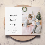 Peace Love and Hugs | Dove Gray Christmas Photo Holiday Card<br><div class="desc">Simple, stylish, minimalist flat holiday photo card with modern informal casual handwritten script typography quote "Peace Love & Hugs" in black with a clean simple white background with a dove gray feature color on the reverse. The name and year can be easily customized for a personal touch. A elegant, minimalist...</div>