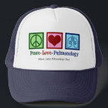 Peace Love Pulmonology Customisable Pulmonologist Trucker Hat<br><div class="desc">Peace Love Pulmonology hat. A cool pulmonologistgift for a pulmonology doctor or nurse with a peace sign,  heart,  and lungs. A great design for a pulmonary specialist who treats asthma and other respiratory issues.</div>