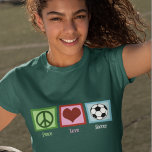 Peace Love Soccer T-Shirt<br><div class="desc">Whether you are a soccer mum or soccer pro,  you will love this cool women's soccer shirt. Peace Love Soccer decorated with a green peace sign,  heart,  and a soccer ball for an avid fan or an awesome soccer player. Order now for a Christmas gift for your soccer coach!</div>