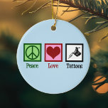 Peace Love Tattoos Ceramic Tree Decoration<br><div class="desc">Peace Love Tattoos. A cool tattoo artist gift with a peace sign,  heart,  and tattoo gun for a tattooist. Cute tattooer present.</div>