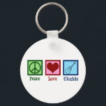 Peace Love Ukulele Key Ring<br><div class="desc">Peace Love Ukulele. Cute ukuleles player gift featuring a cool peace sign,  heart,  and uke instrument.</div>