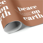 Peace On Earth Personalised Blue Modern Christmas Wrapping Paper<br><div class="desc">Elevate your holiday gift-giving with our Peace On Earth Personalised Navy Blue Modern Christmas Wrapping Paper. This deep and sophisticated wrapping paper is designed for those who appreciate the beauty of simplicity and want to convey a message of peace and goodwill during the festive season. The rich navy blue background...</div>