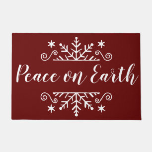 Peace on earth with snowflake doormat