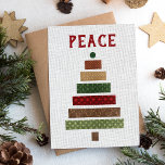 Peace Rustic Burlap Christmas Tree Holiday Card<br><div class="desc">This rustic Christmas card features the word "Peace" in red distressed font above a collage Christmas tree in red,  green,  and brown faux burlap holiday patterns on a beige linen-look background. Customise the reverse with your message,  family names,  and date in red text.</div>