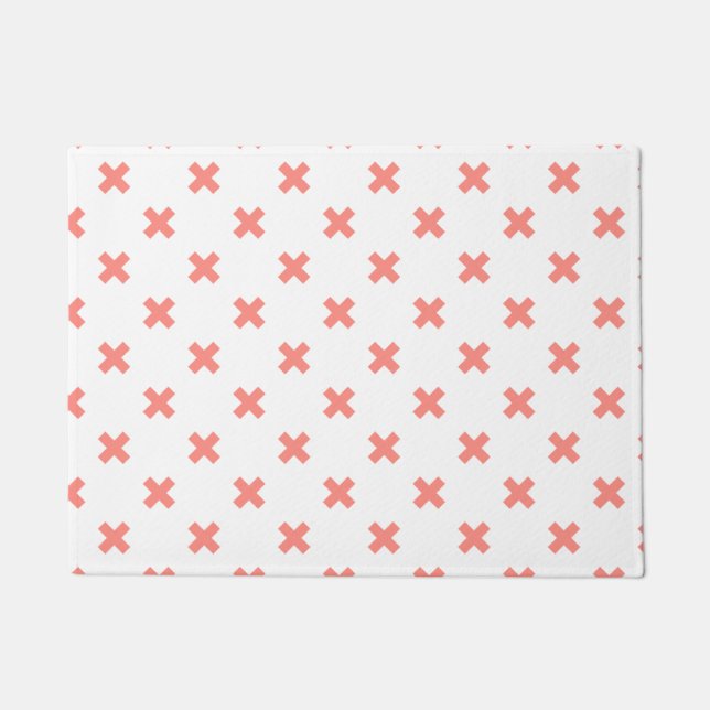 Peach cross stitches on white doormat (Front)