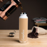 Peach Personalised Wedding Bridesmaid Water Bottle<br><div class="desc">Gift your wedding bridesmaid or maid of honour with this trendy, vacuum Insulated water bottle that features her name in white, stylised script on a peach colour background designed to match your wedding colour scheme. Personalise bottle by editing and replacing name with your own as desired. Select your water bottle...</div>