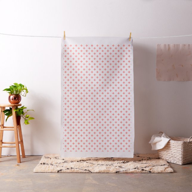 Peach polka crosses on white fabric (In Situ)