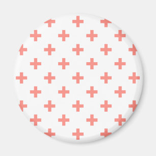 Peach polka crosses on white magnet