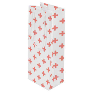Peach polka crosses on white wine gift bag