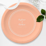 Peach White Elegant Modern Wedding  Paper Plate<br><div class="desc">Soft peach and crisp white come together in a modern, minimalist wedding plate designed with quiet elegance. Clean white lettering highlights the couple’s names and event date, framed by a refined double border that keeps the look timeless and beautifully simple. Personalise with your details to create a coordinated, effortless touch...</div>