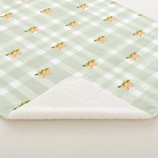 Peaches and sage green plaid sherpa throw blanket