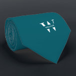 Peacock Blue Colour Elegant Monogram   Name  Tie<br><div class="desc">An elegant necktie featuring a bold white monogram across a smooth Colour background. On top of this monogram sits your first or last name spelled out in all capitals. If you prefer a bolder look for the personal name inside of the large letter you can do the following: Use the...</div>