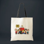Peanuts | Happiness is Being One of the Gang Tote Bag<br><div class="desc">Happiness is indeed being part of the Peanuts gang,  as depicted in the beloved comic strip and its various adaptations. The Peanuts characters,  despite their flaws and struggles,  find joy in their close-knit friendships and shared experiences.</div>