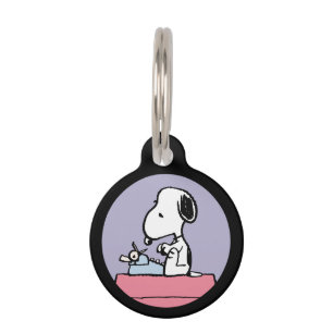 Peanuts   Snoopy at the Typewriter Pet Tag