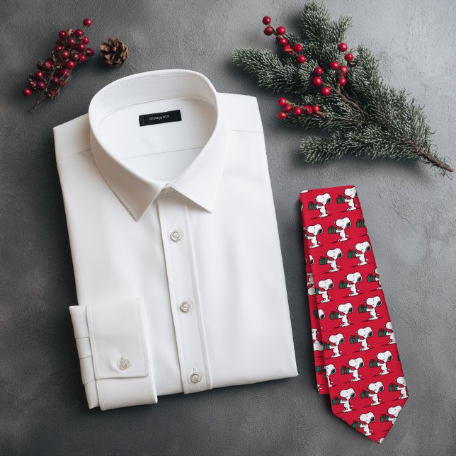 Peanuts | Snoopy Christmas Gift Giver Tie (Tie next to shirt on Christmas themed table)