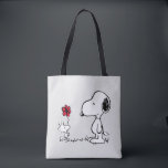 Peanuts | Snoopy & Woodstock Red & Black Tote Bag<br><div class="desc">Bring the timeless charm and heartfelt friendship of Peanuts' Snoopy and Woodstock into your life with this delightful collection, featuring their iconic red flower moment. This classic illustration captures Woodstock sweetly presenting a flower to his best pal, making every item in this collection a pure joy to own or gift!...</div>