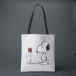 Peanuts | Snoopy & Woodstock Red & Black Tote Bag<br><div class="desc">Bring the timeless charm and heartfelt friendship of Peanuts' Snoopy and Woodstock into your life with this delightful collection, featuring their iconic red flower moment. This classic illustration captures Woodstock sweetly presenting a flower to his best pal, making every item in this collection a pure joy to own or gift!...</div>