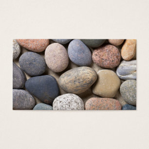 Pebble Stones On Sand For Background