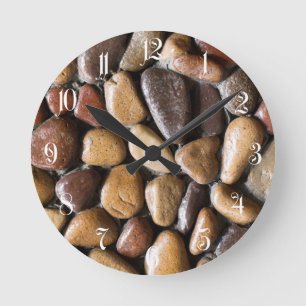 Pebbles background round clock