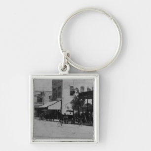 Pedestrians, cyclists, and horse-carriages key ring
