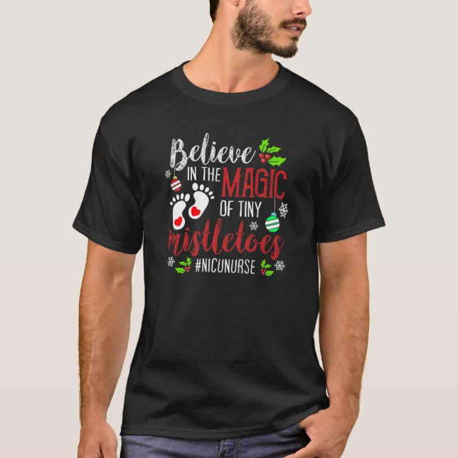 PEDS NICU Nurse Believin magic of tiny mistletoe C T-Shirt (Front)