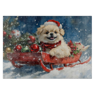 Pekingese Dog in Sledge Let it Snow Christmas Cutting Board