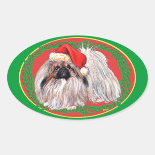 Pekingese in Winter Oval Sticker