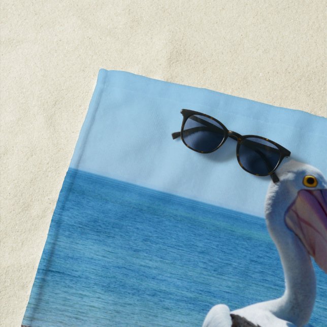 Pelican Perched On A Beach Rock, Towel (In Situ)