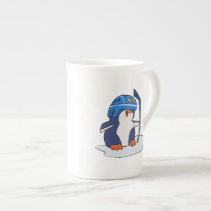 Penguin hockey player   choose background colour bone china mug