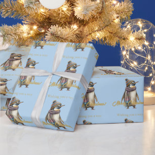 Penguin in a snowy landscape Merry Christmas Wrapping Paper