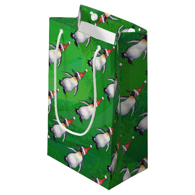 Penguin in Santa Hat Pattern on Green Small Gift Bag (Front Angled)
