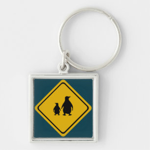 penguin road sign key ring